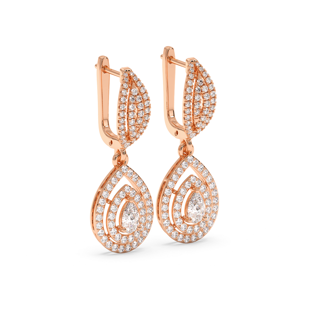 Earrings with Central Pear Cut Diamond of 0.25ct each and Lateral Diamonds of 1.12ct