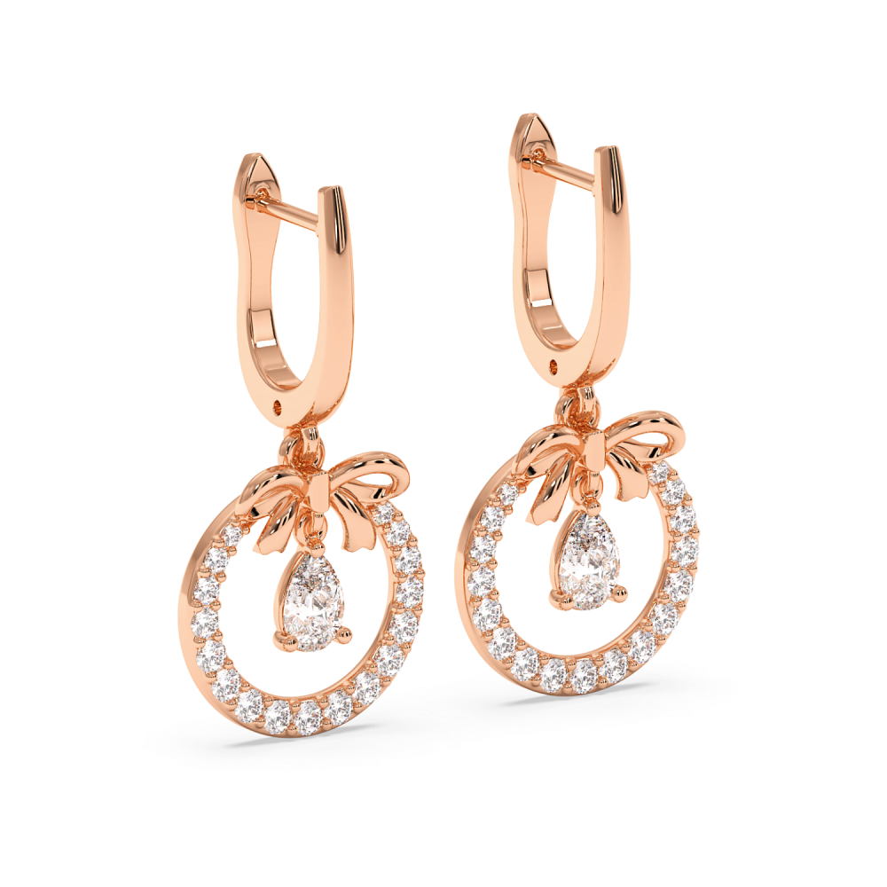 Earrings with 0.36ct Pear Cut Diamonds and 0.34ct Round Diamonds