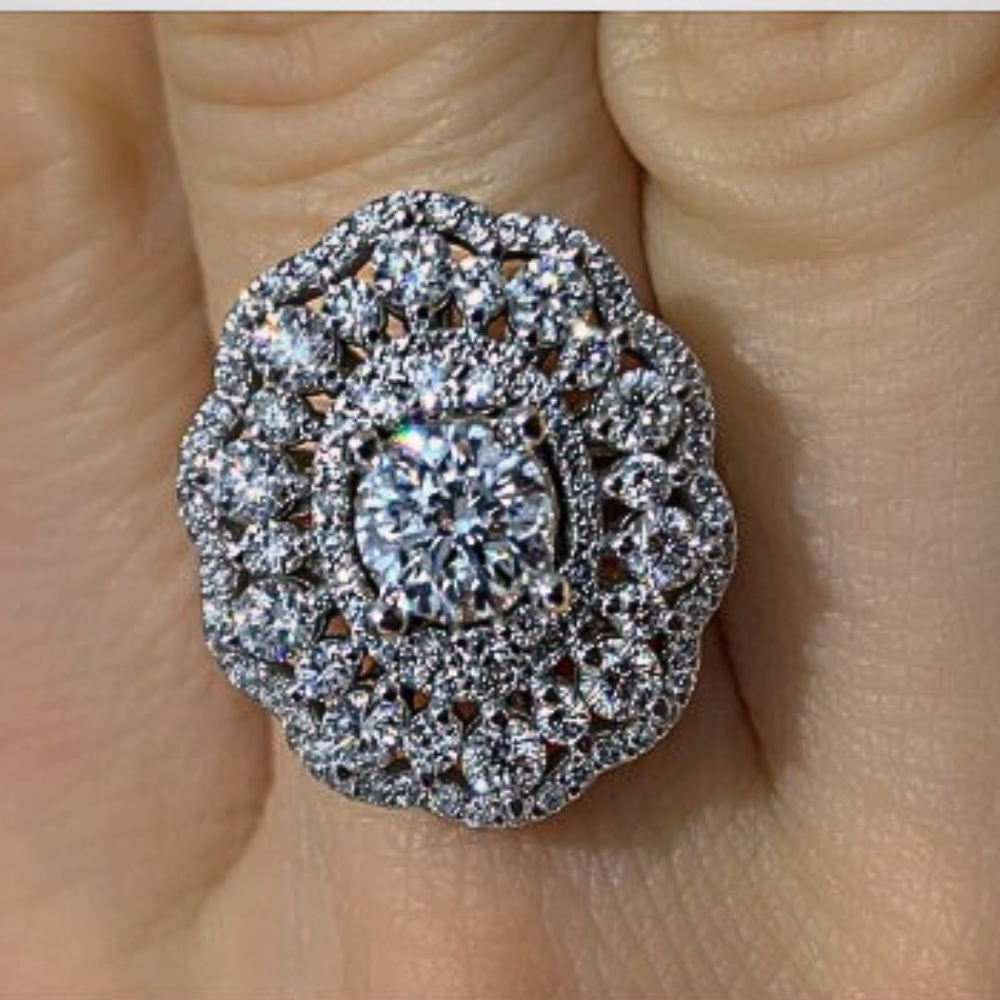 Ring with 1.01 ct center diamond and 1.66 ct side diamonds