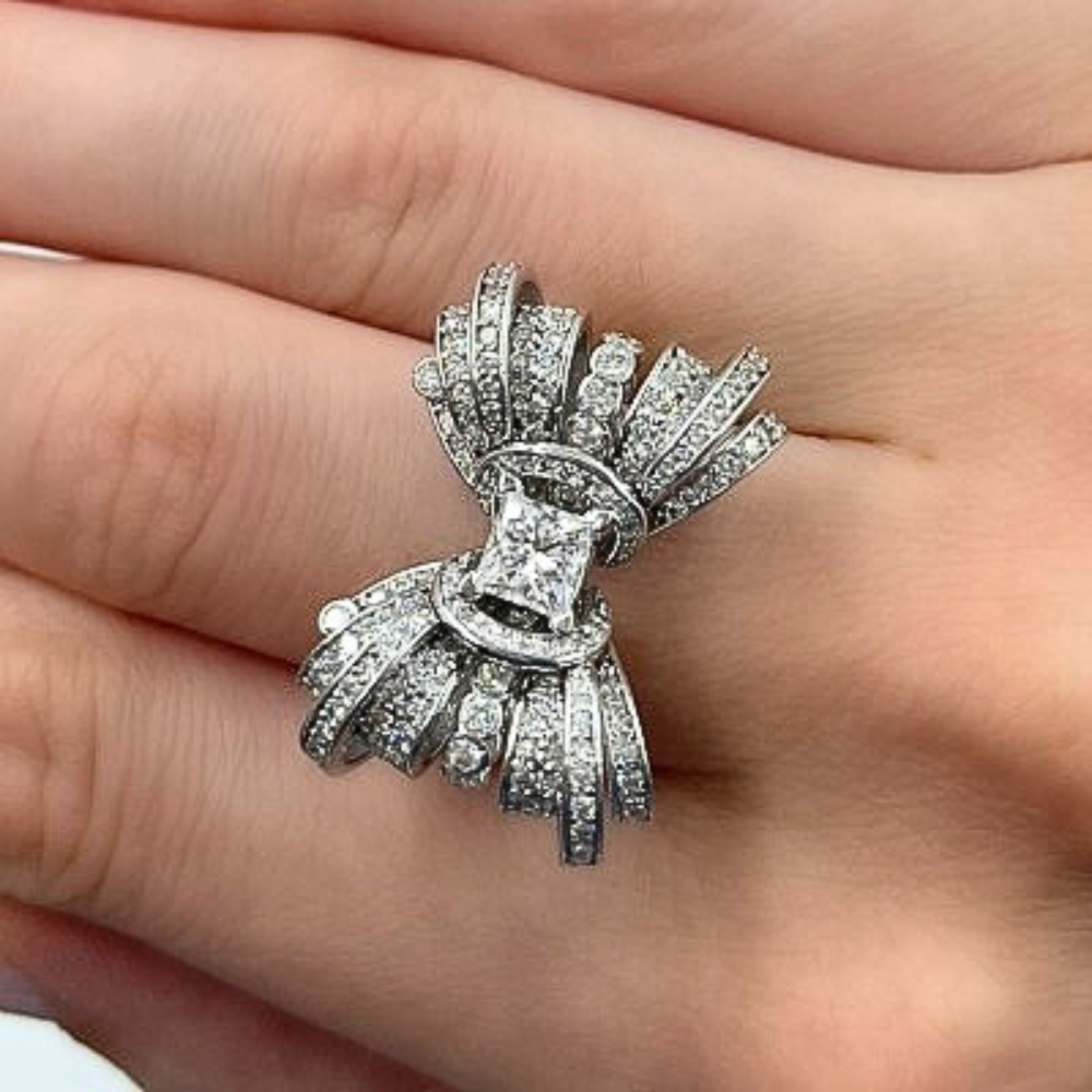 Ring with 0.71 ct Princess center diamond and 1.72 ct side diamonds