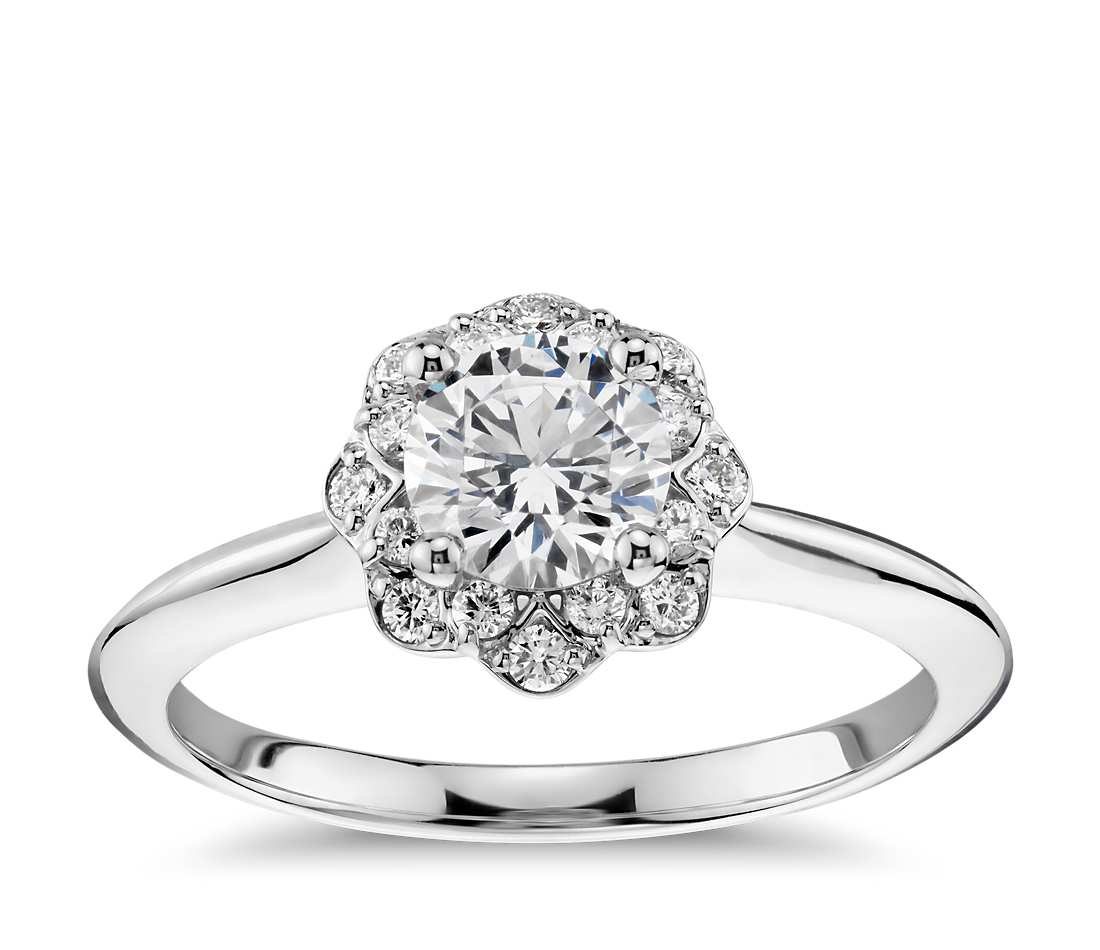 Ring with central diamond 0.40 ct and side diamonds 0.30 ct