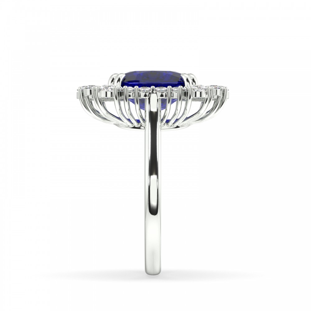 Ring with Pear diamonds of 0.74 ct, round diamonds of 0.36 ct and Tanzanite of 5.54 ct