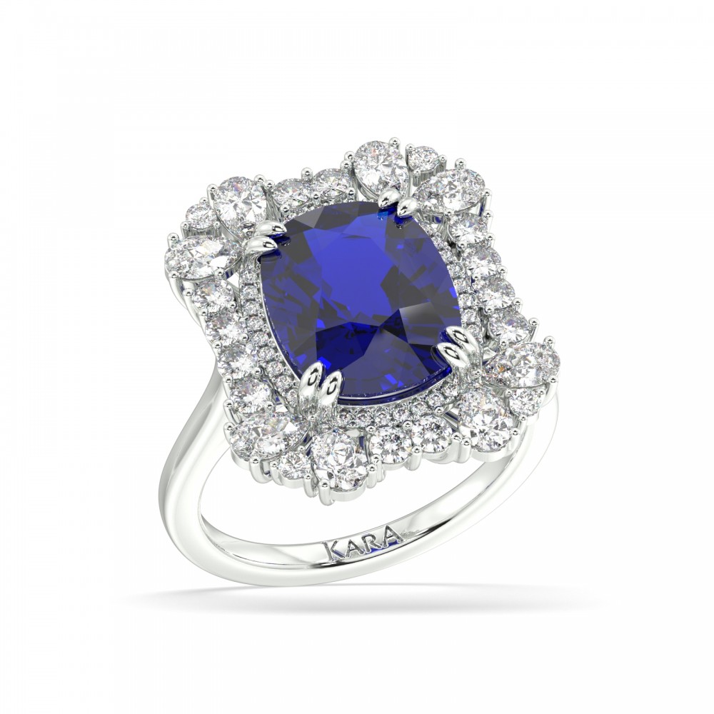 Ring with Pear diamonds of 0.74 ct, round diamonds of 0.36 ct and Tanzanite of 5.54 ct