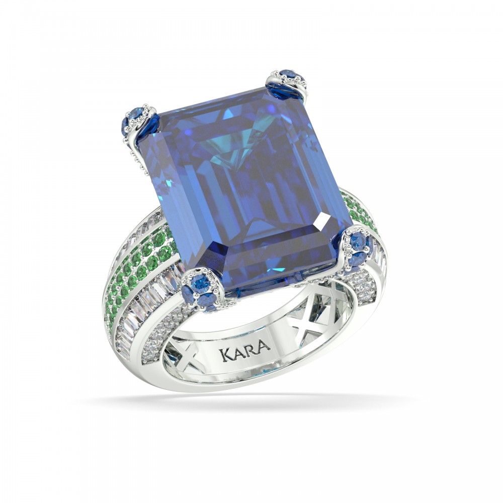 Ring with 1.00 ct Round Diamonds, 0.94 ct Baget Diamonds, 0.10 ct London Blue Topaz, 0.26 ct Emeralds and 20.5 ct London blue Topaz