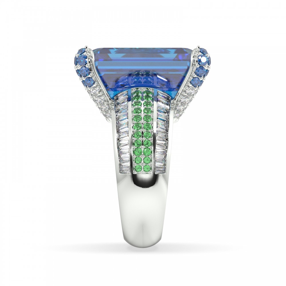 Ring with 1.00 ct Round Diamonds, 0.94 ct Baget Diamonds, 0.10 ct London Blue Topaz, 0.26 ct Emeralds and 20.5 ct London blue Topaz