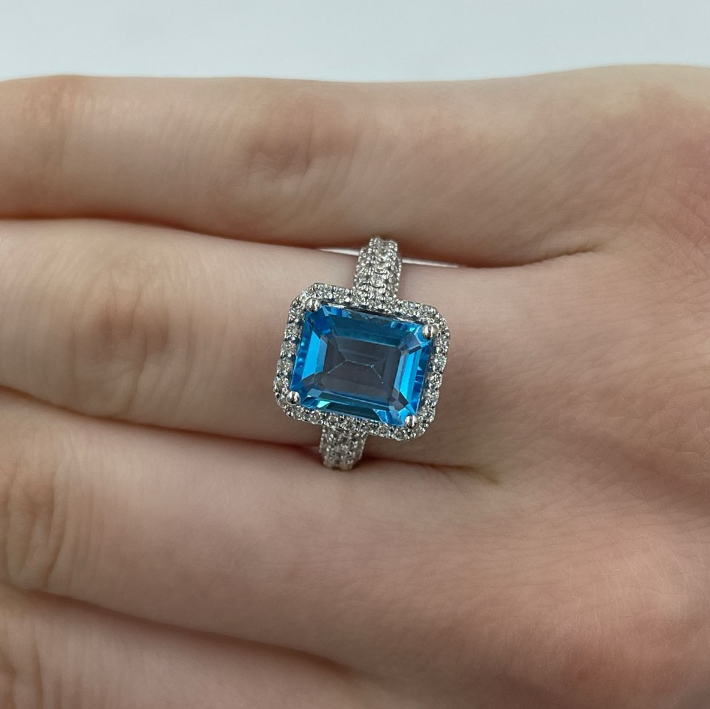 Ring with 0.43 ct Diamonds and 2.87 ct Blue Topaz