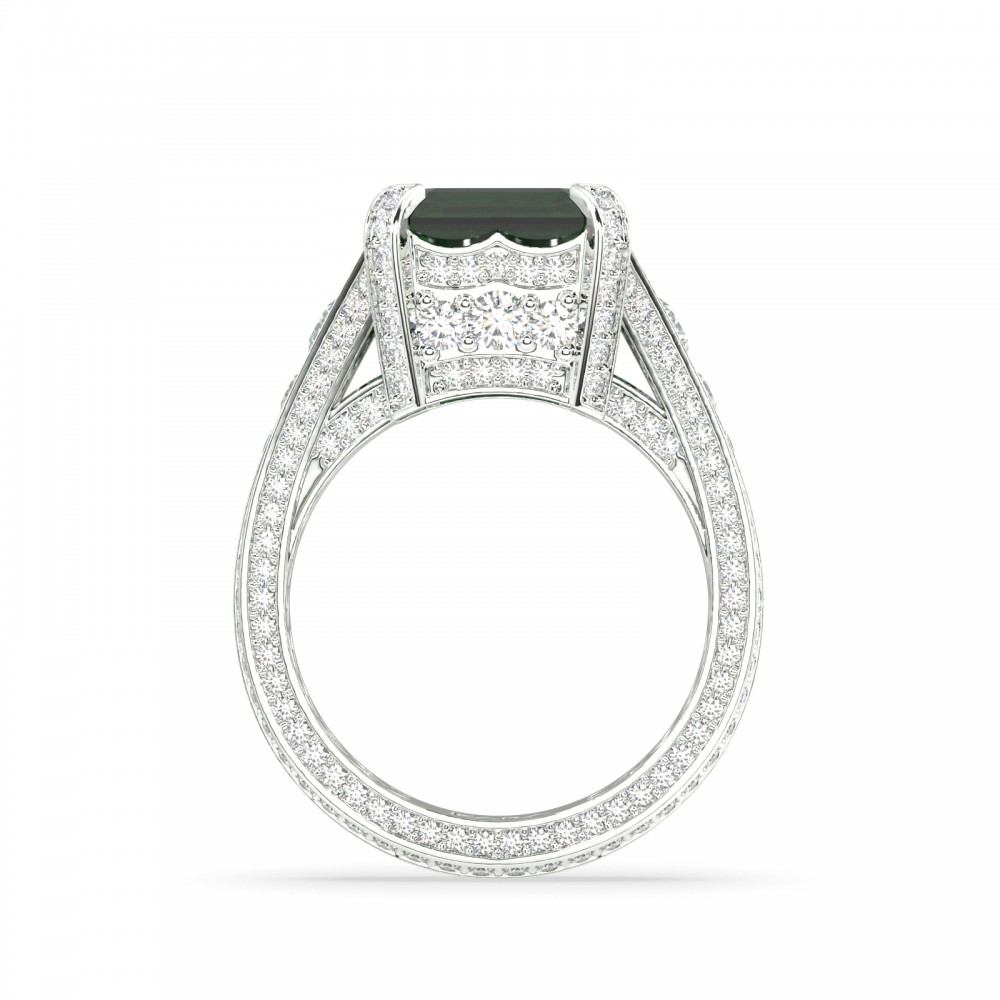 Ring with 6.95ct center emerald and 1.94ct side diamonds