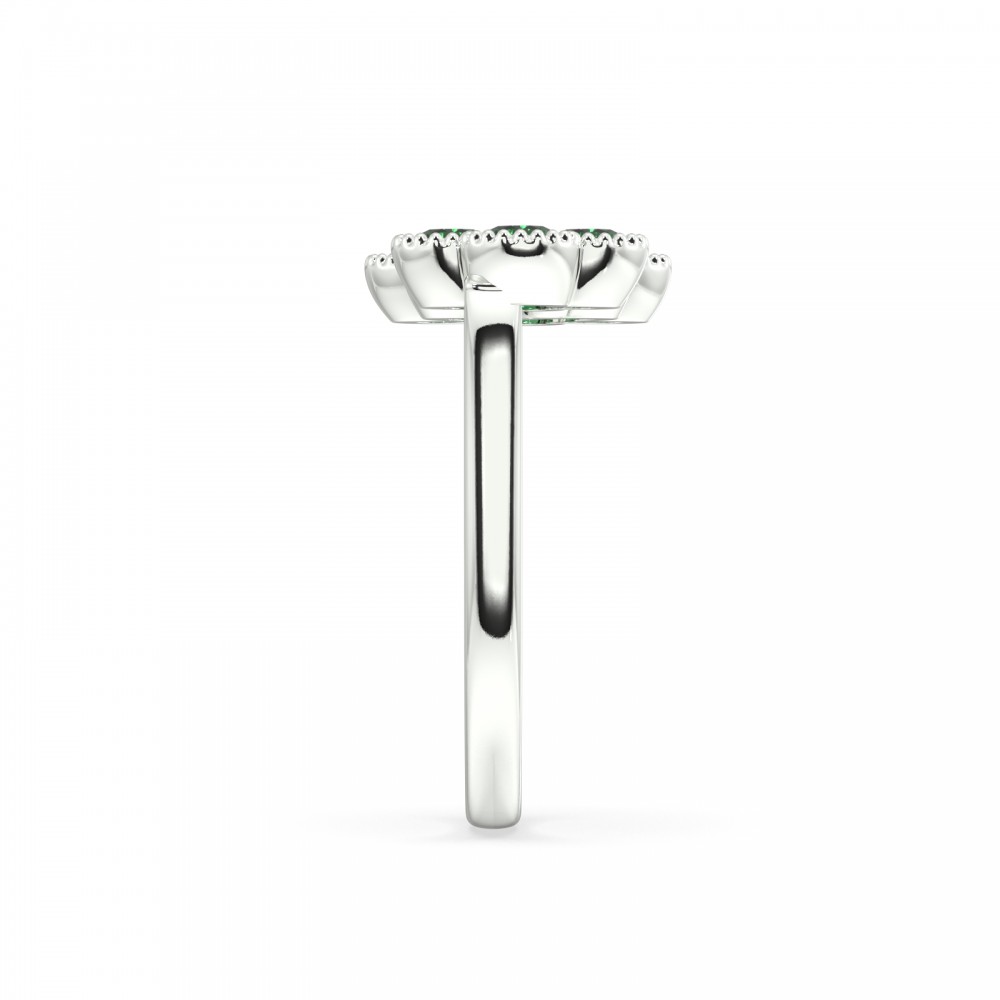 Ring with 1.89ct pear cut emeralds and 0.03ct round diamonds.