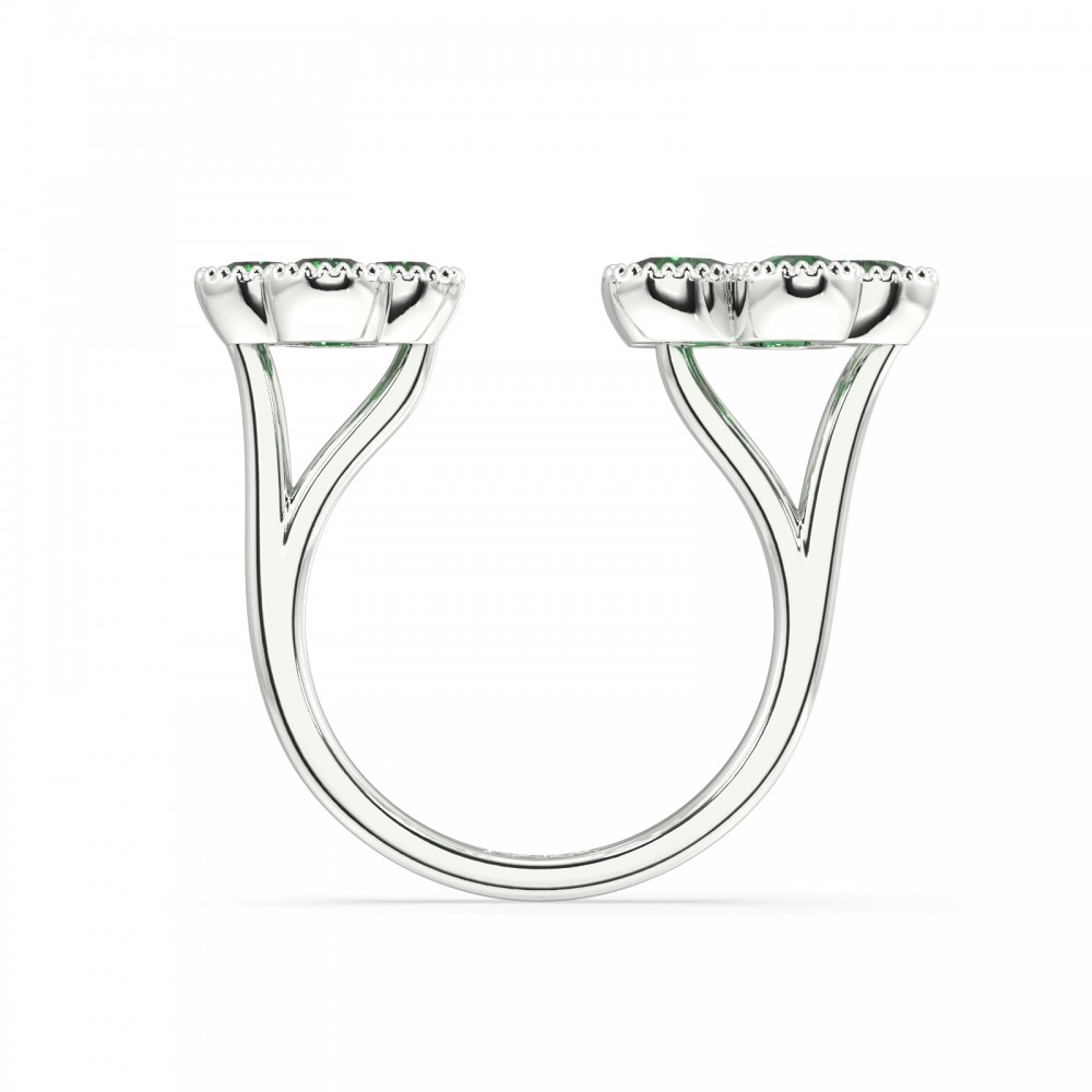 Ring with 1.89ct pear cut emeralds and 0.03ct round diamonds.