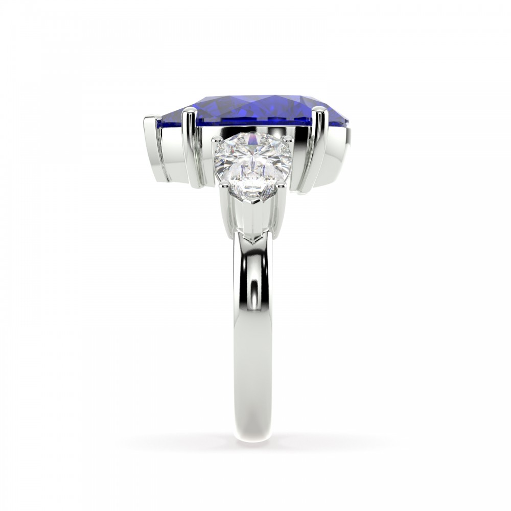 Ring with 5.35ct Central Pear Cut Tanzanite and 1.00ct Pear Cut Diamonds