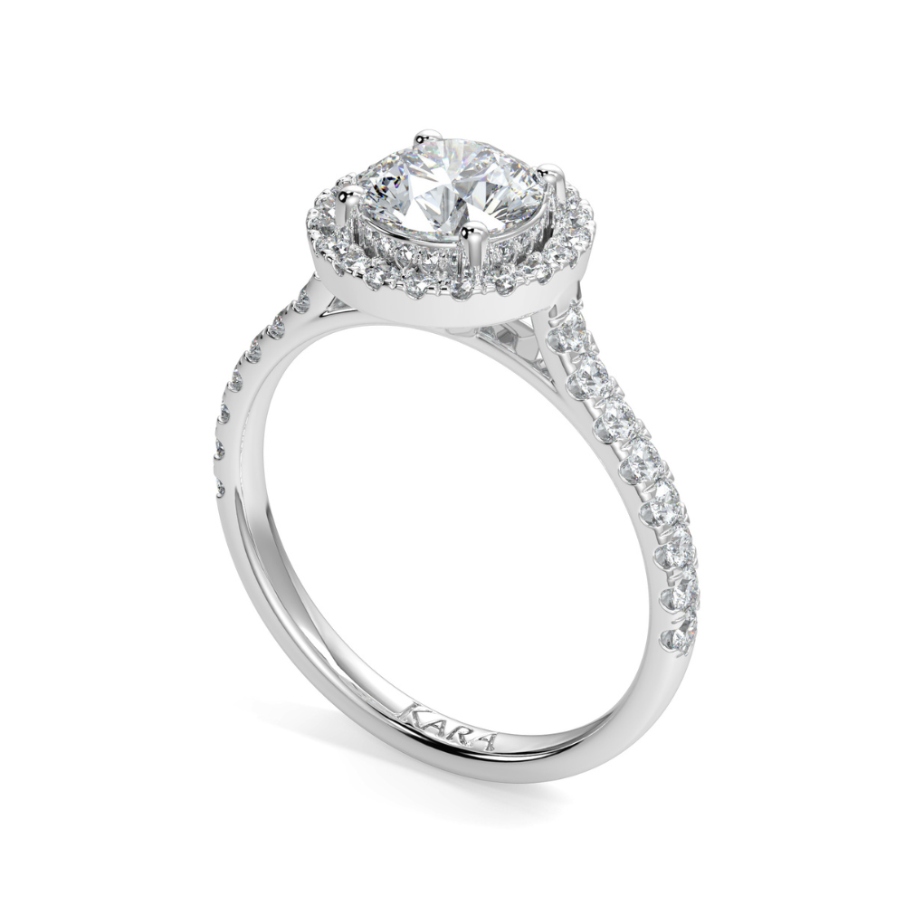 Engagement ring with central diamond of 0.70 ct and side diamonds of 0.20 ct