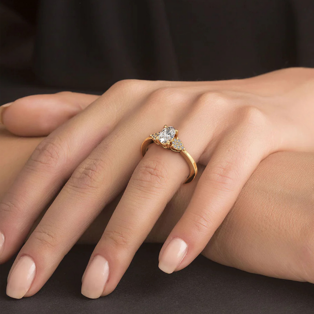 Engagement ring with 0.71 ct oval center diamond and 0.08 ct side diamonds