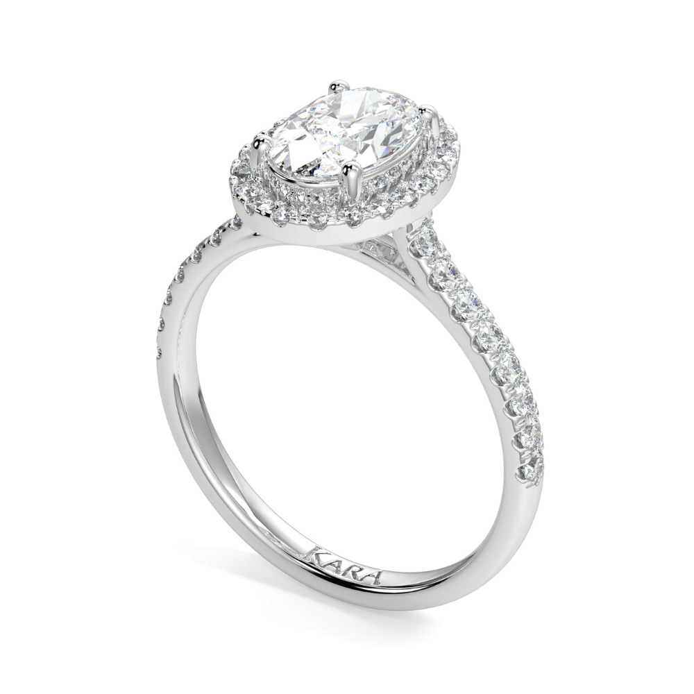 Engagement ring with 1.00 ct center diamond and 0.26 ct side diamonds