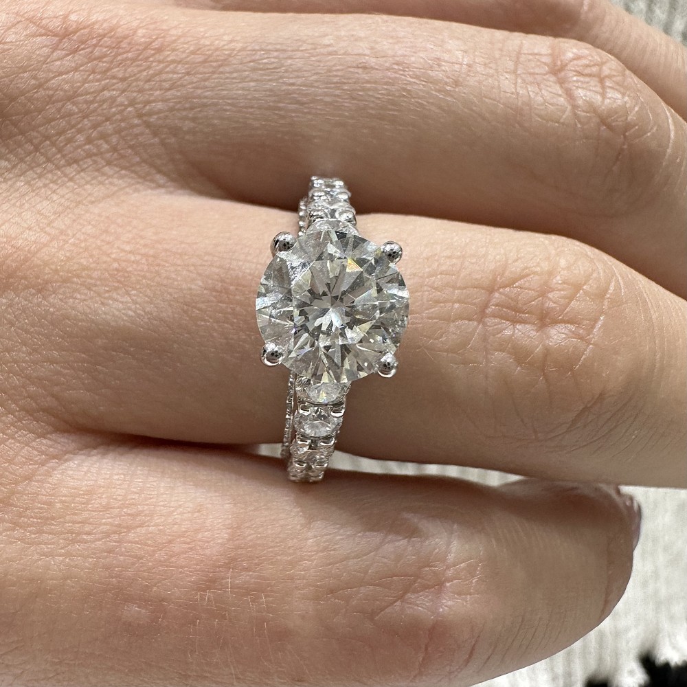 Engagement ring with 2.05 ct center diamond and 1.10 ct side diamonds