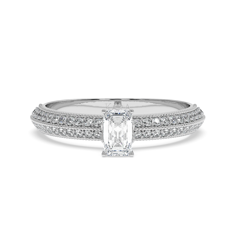 Engagement ring with 0.31 ct Emerald diamond and 0.19 ct side diamonds