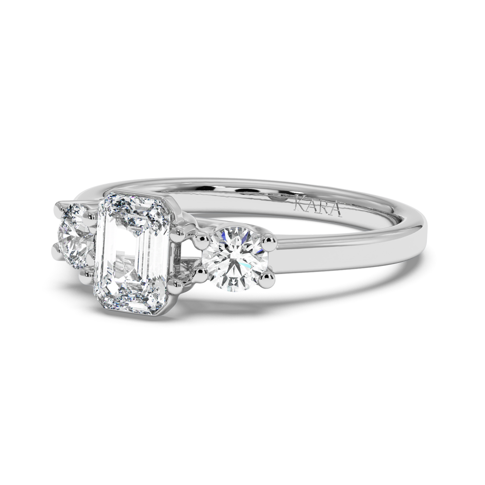 Engagement ring with 0.71 ct Emerald diamond and 0.27 ct side diamonds