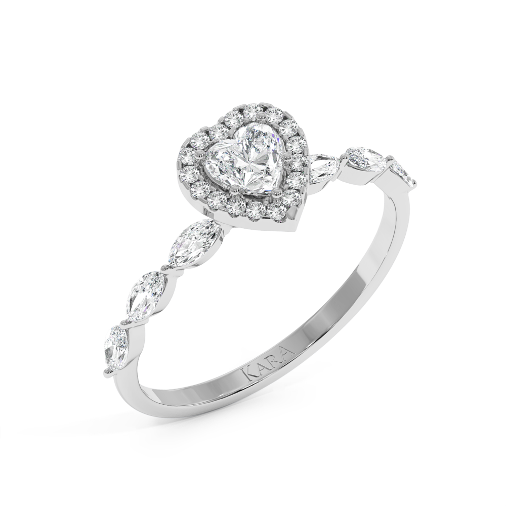 Engagement ring with Heart diamond of 0.30 ct and Marquise side diamonds of 0.21 ct and round diamonds of 0.06 ct