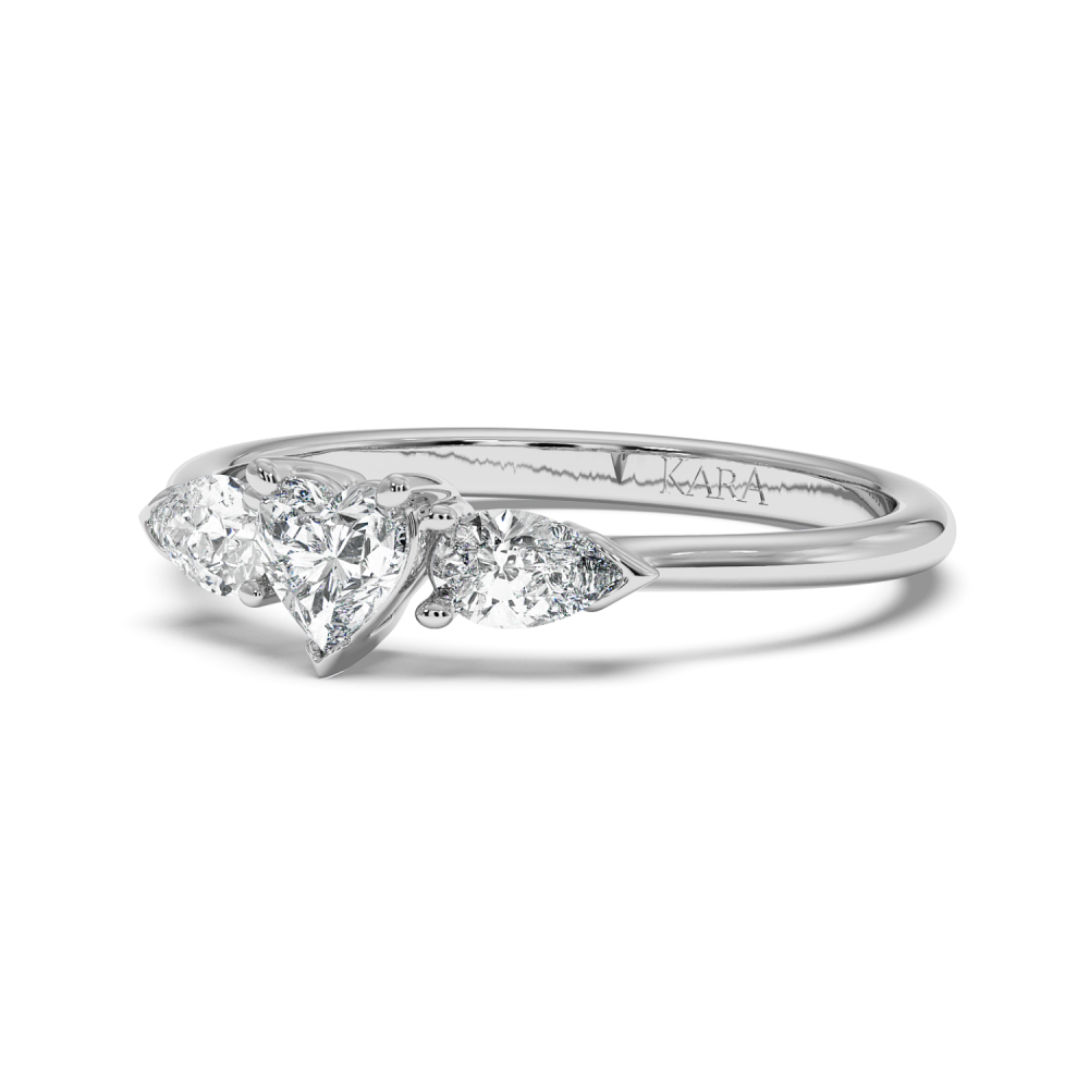 Engagement ring with 0.30 ct Heart diamond and 0.19 ct Pear side diamonds