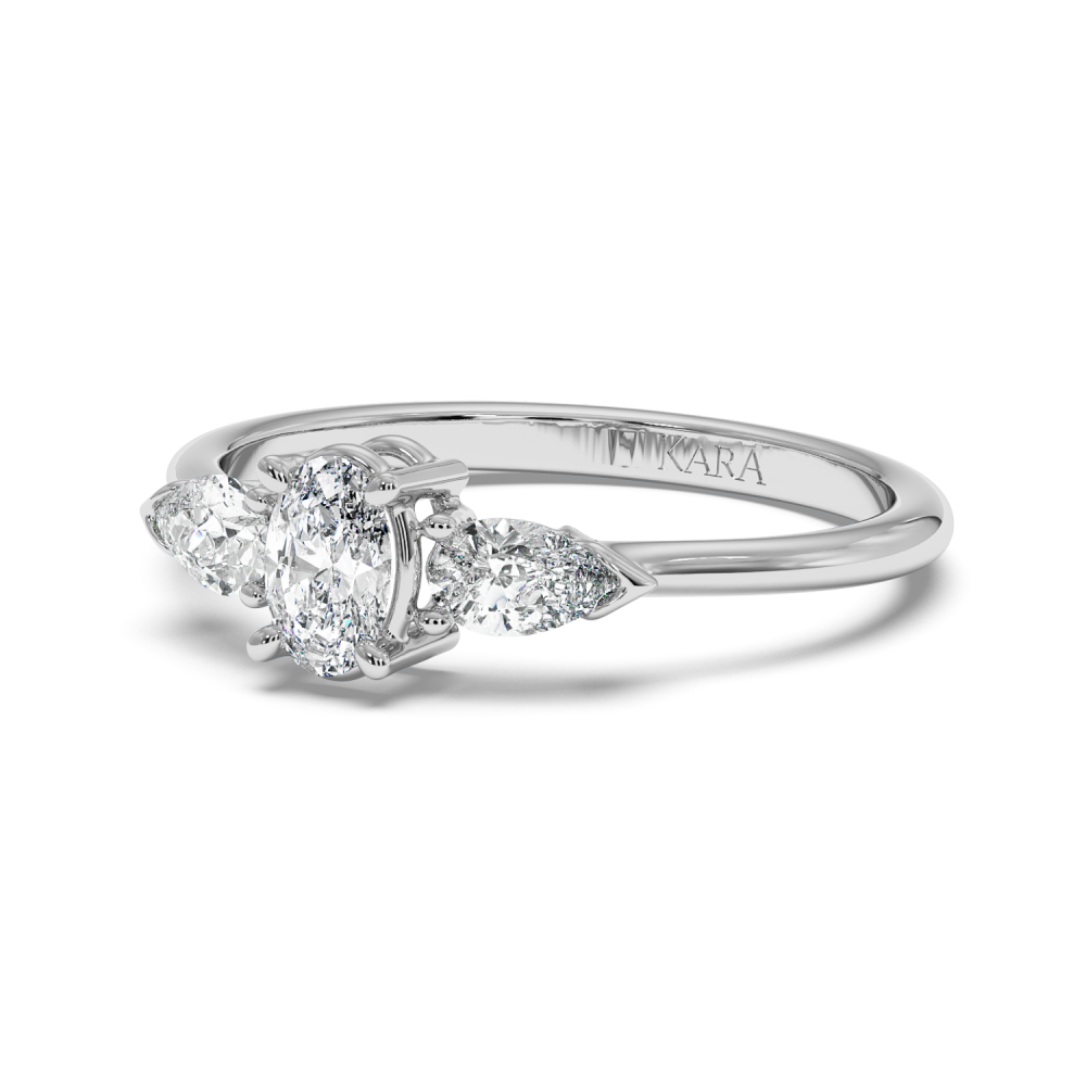 Engagement ring with 0.30 ct Oval diamond and 0.19 ct Pear side diamonds