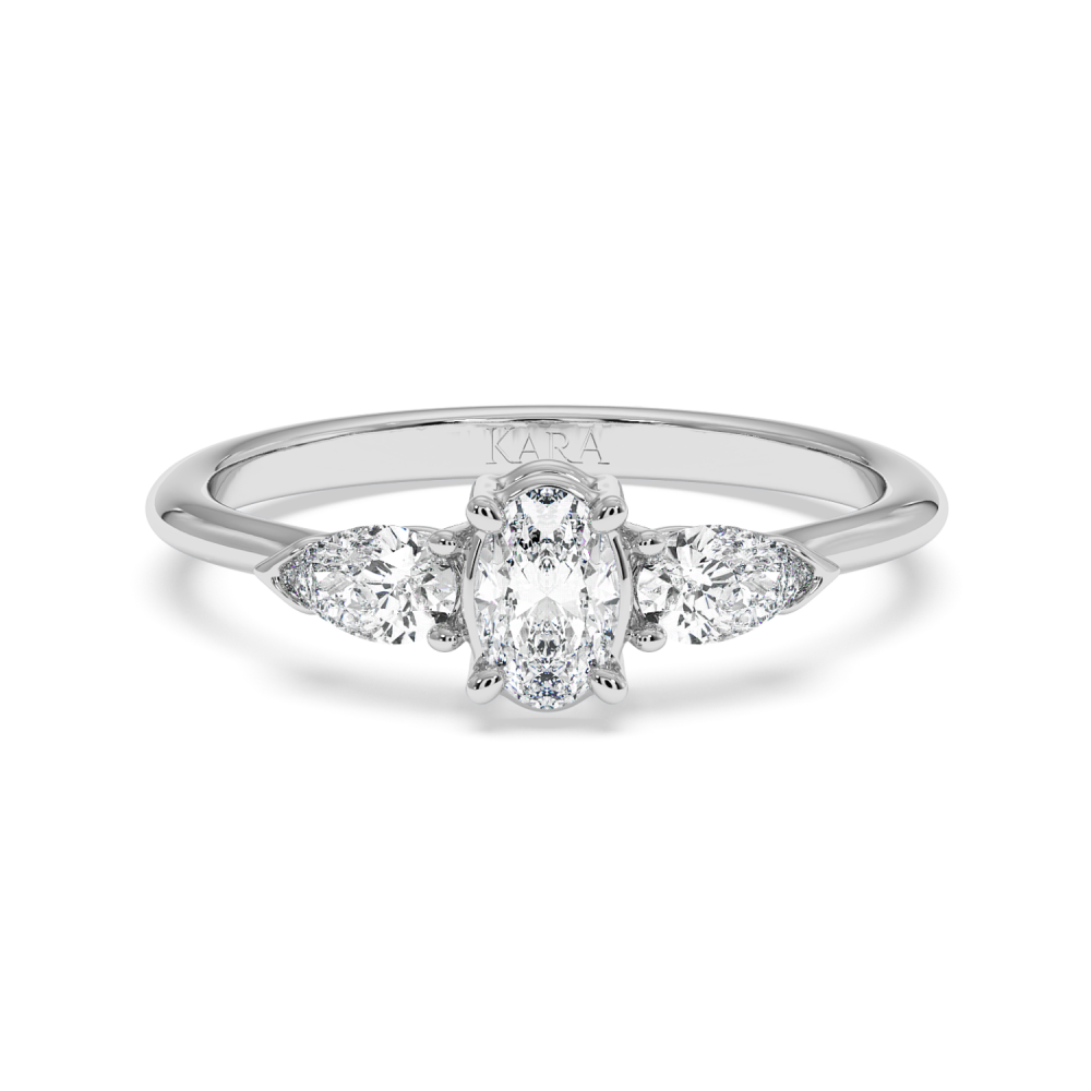 Engagement ring with 0.30 ct Oval diamond and 0.19 ct Pear side diamonds