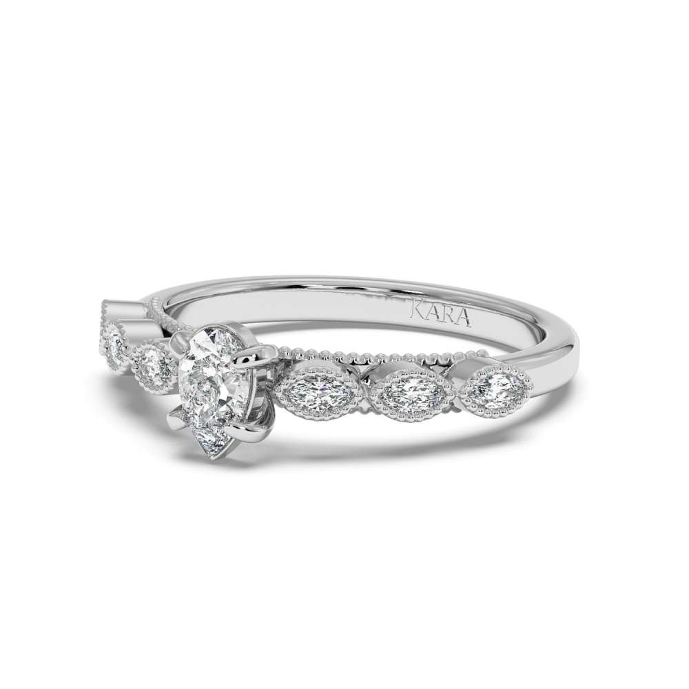 Engagement ring with 0.30 ct Pear diamond and 0.13 ct side diamonds