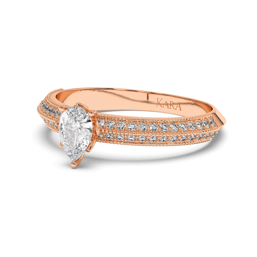 Engagement ring with 0.30 ct Pear diamond and 0.19 ct side diamonds