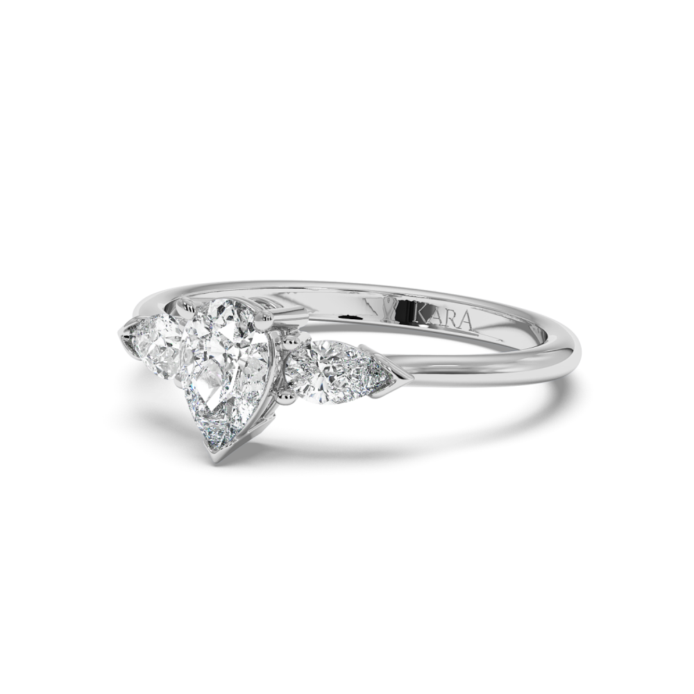 Engagement ring with 0.30 ct Pear diamond and 0.19 ct Pear side diamonds
