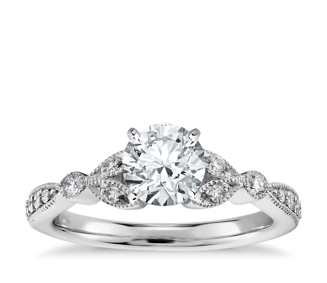 Engagement ring with central diamond of 0.57 ct and side diamonds of 0.20 ct