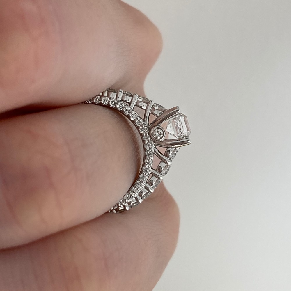 Engagement ring with 1.00 ct center diamond and 1.17 ct side diamonds