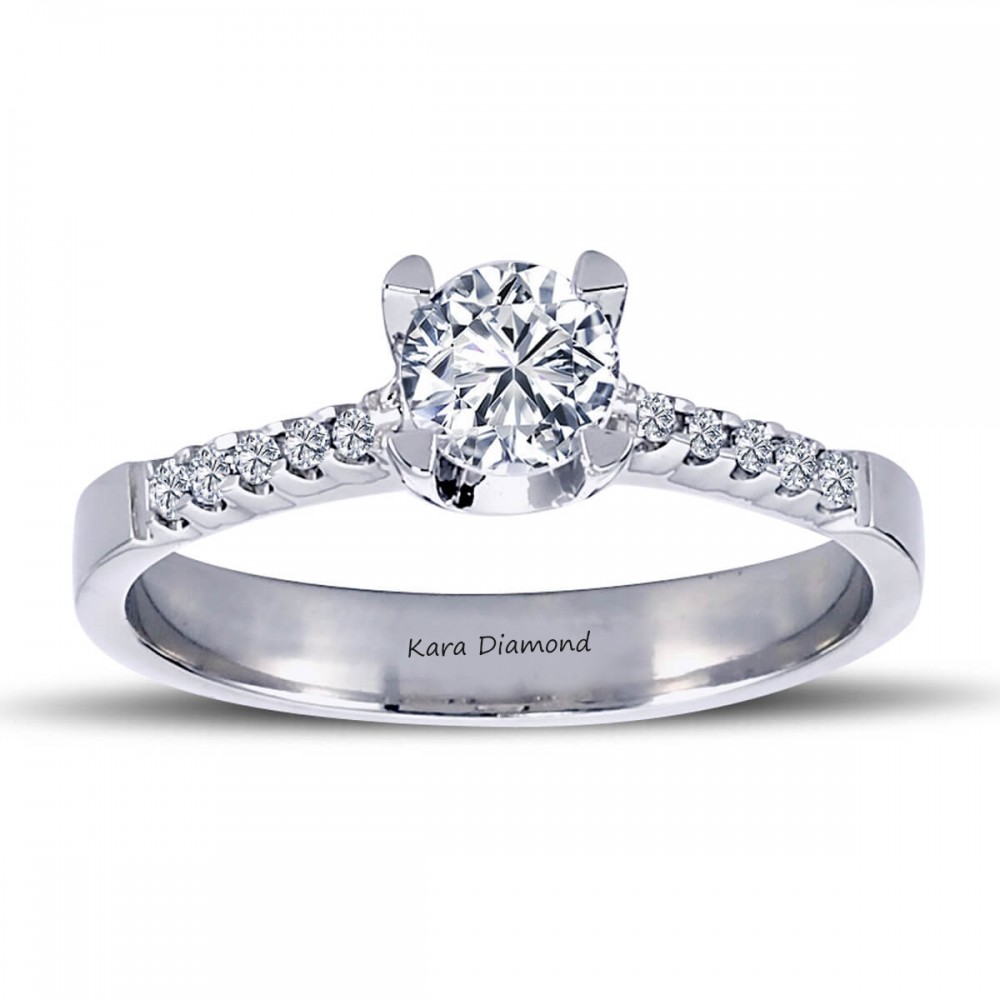 Engagement ring with 0.40 ct center diamond and 0.10 ct side diamonds
