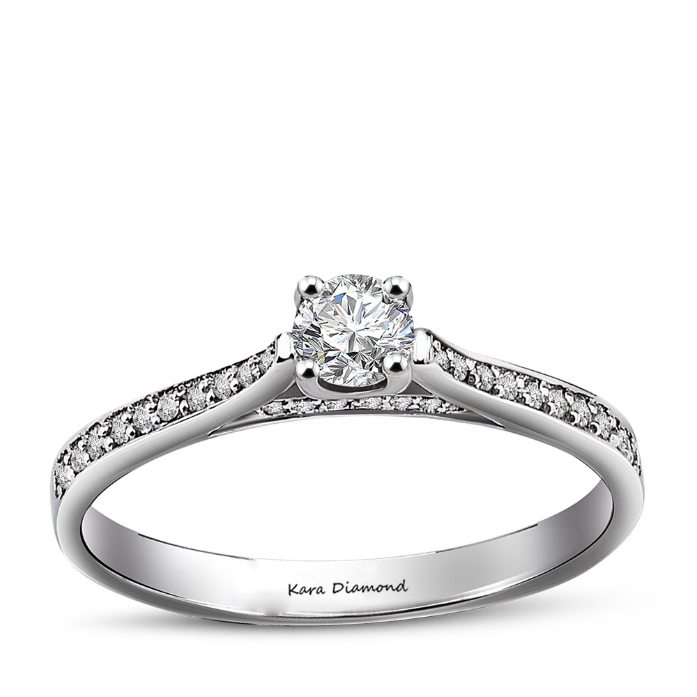 Engagement ring with 0.50 ct center diamond and 0.20 ct side diamonds