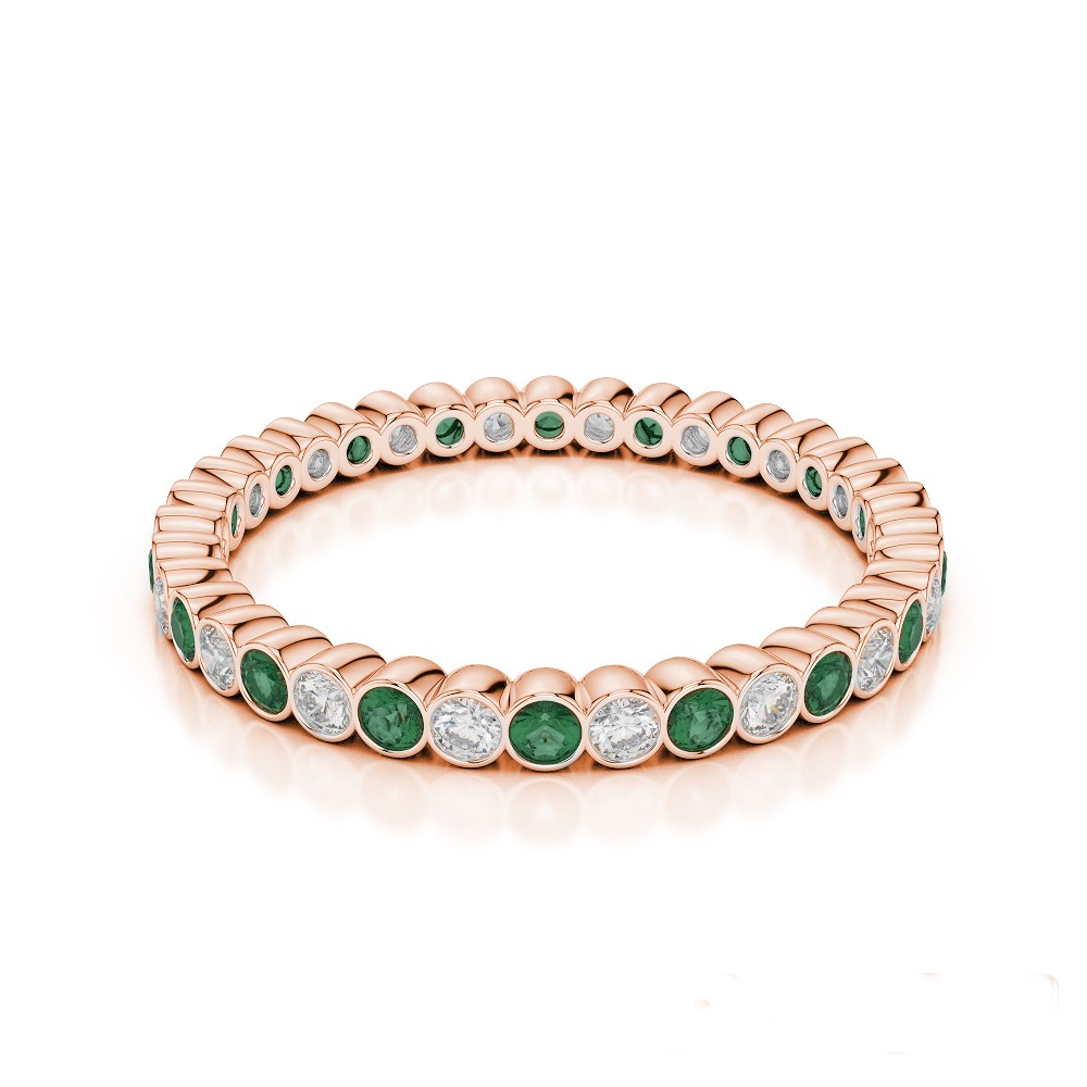 Eternity ring with 0.20 ct diamonds and 0.30 ct emeralds