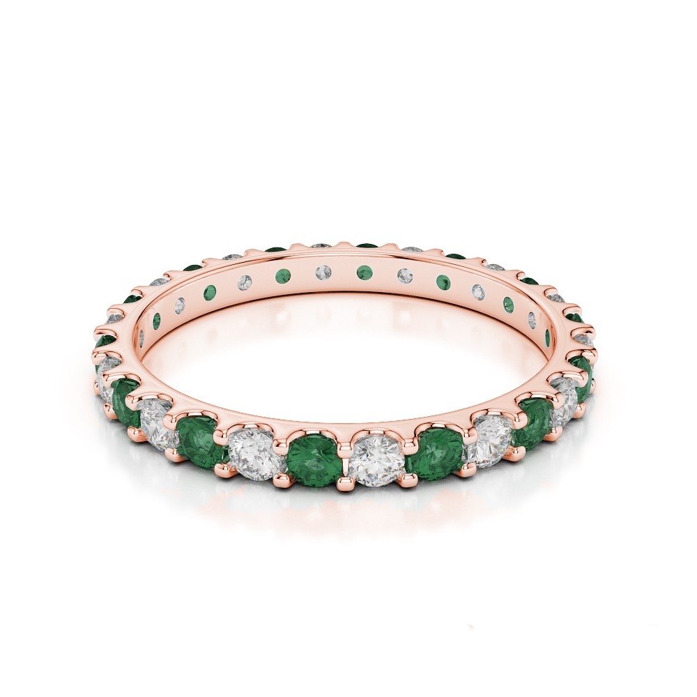 Eternity ring with 0.50 ct diamonds and 0.60 ct emeralds