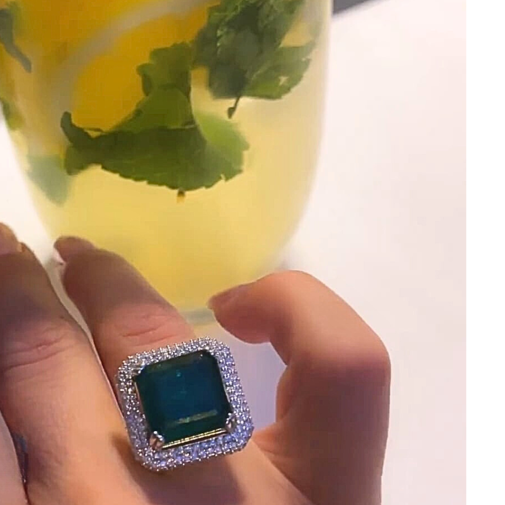 ILEANA Ring with 1.52 ct Diamonds and 12.44 ct Emerald