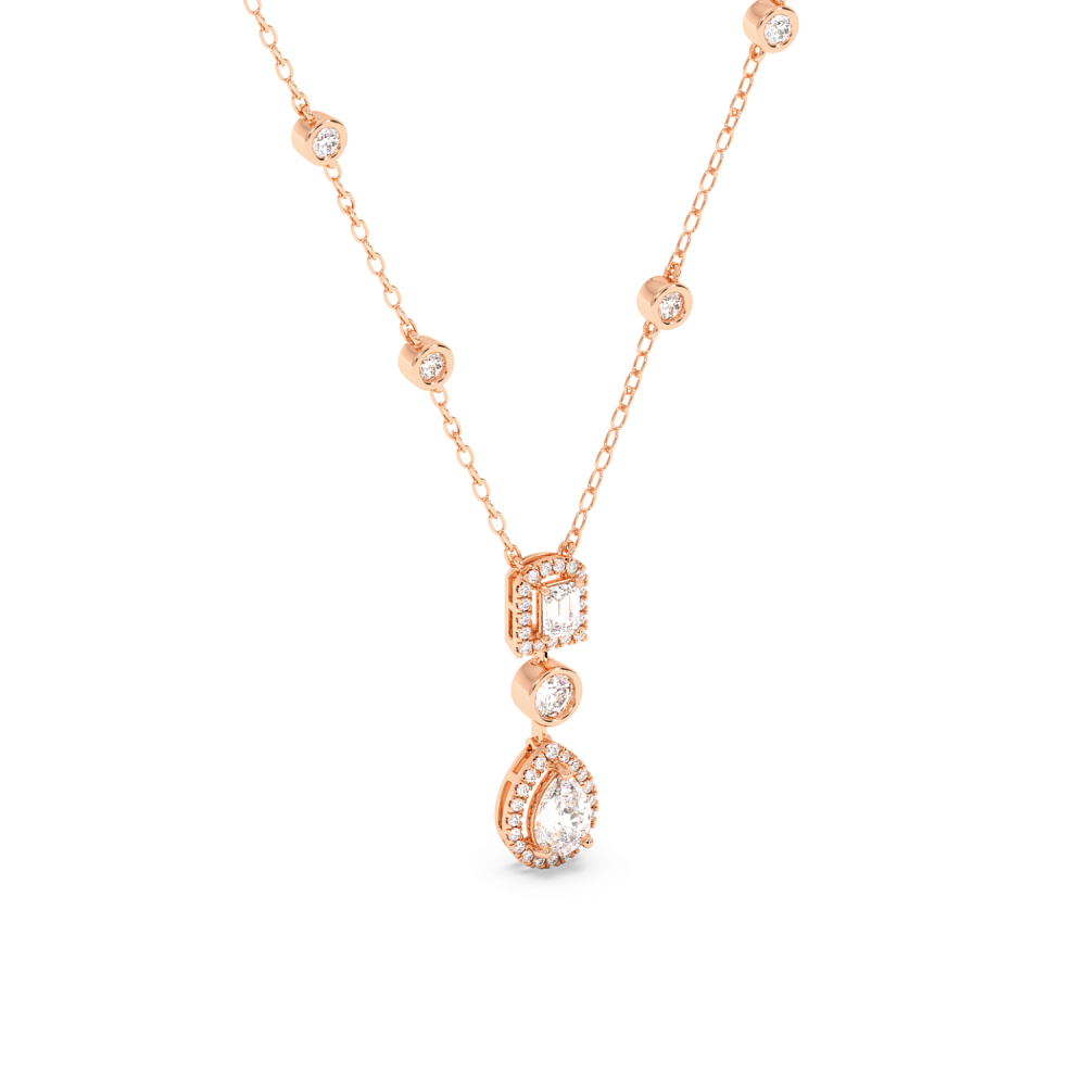 Pendant with 0.71ct Pear Cut Diamond, 0.25ct Emerald Cut Diamond and 0.67ct Round Diamonds