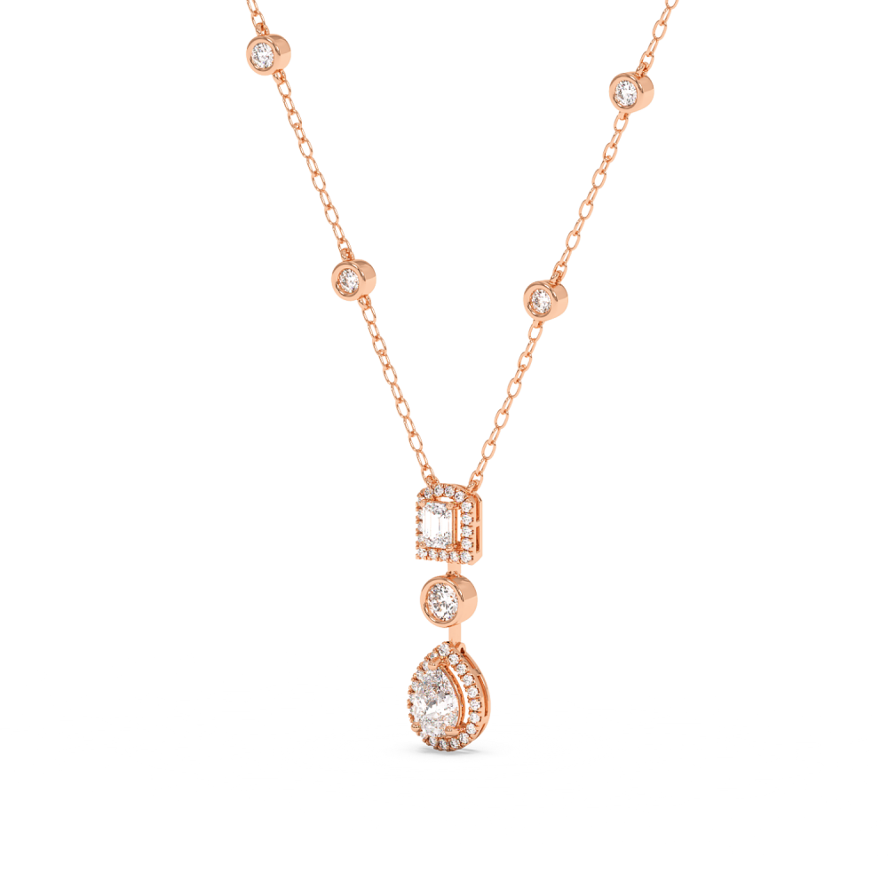 Pendant with 0.71ct Pear Cut Diamond, 0.25ct Emerald Cut Diamond and 0.67ct Round Diamonds