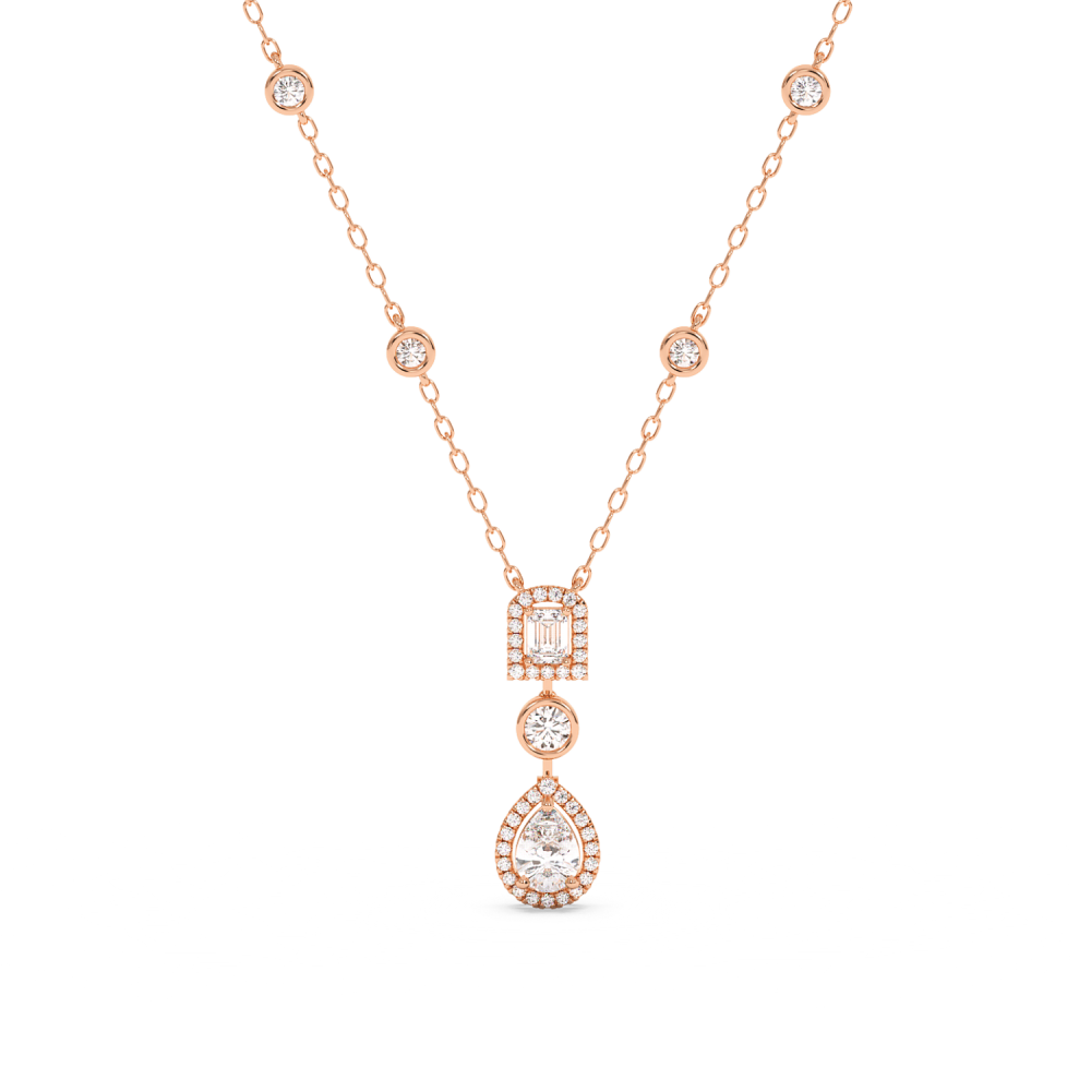 Pendant with 0.71ct Pear Cut Diamond, 0.25ct Emerald Cut Diamond and 0.67ct Round Diamonds