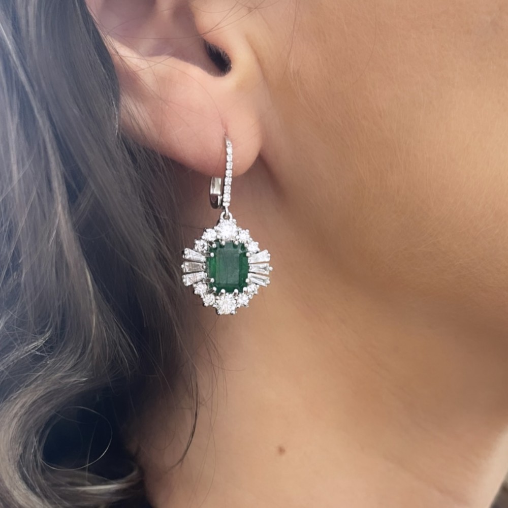 Set with 6.63 ct Emeralds, 2.42 ct Round Diamonds and 1.06 ct Baget Diamonds