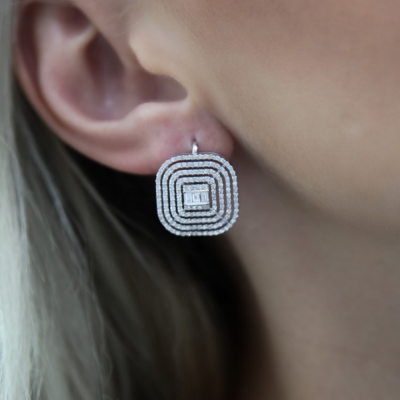 Earrings with 0.19 ct baget and 0.97 ct round diamonds