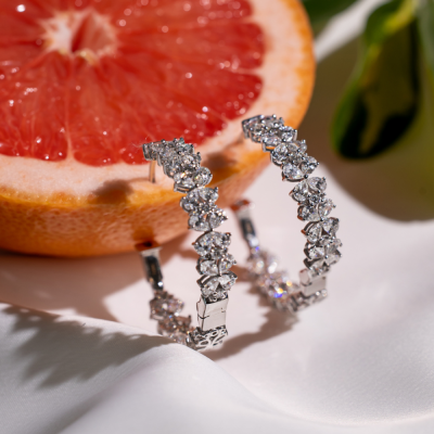 Earrings with 6.70 ct Pear diamonds and 0.91 ct round diamonds