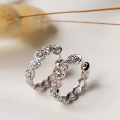 Earrings with 0.19 ct marquise diamonds and 1.04 ct round diamonds