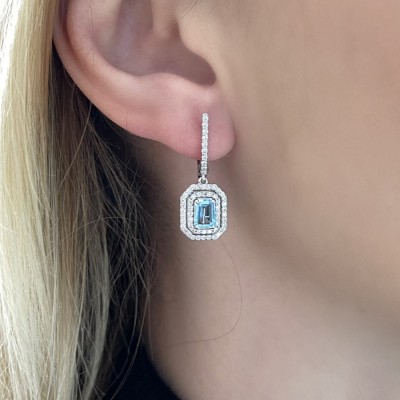 0.64 ct diamond and 1.21 ct blue-topaz earrings