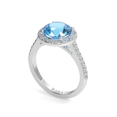Ring with 0.54 ct Blue Topaz and 0.30 ct side diamonds