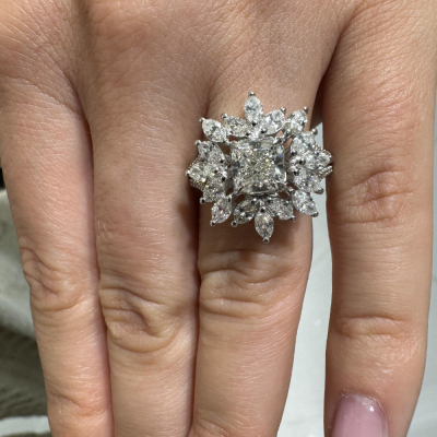 Ring with 1.50 ct center diamond, 1.69 ct Marquise diamonds and 0.18 ct side diamonds