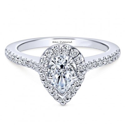 Engagement ring with 0.70 ct Pear diamond and 0.40 ct side diamonds