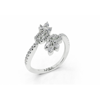 Ring with 0.31ct Pear Cut diamonds, 0.02ct baget diamonds and 0.16ct round diamonds