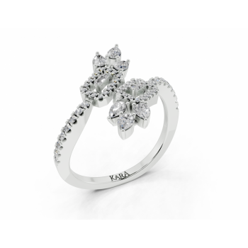 Ring with 0.31ct Pear Cut diamonds, 0.03ct Baget diamonds and 0.16ct round diamonds