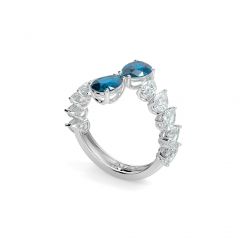 2.30ct Central London Blue Topaz and 2.04ct Pear Cut Diamonds ring