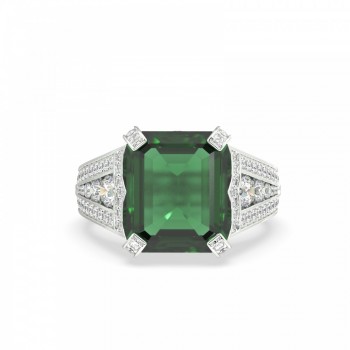 Ring with 6.95ct center emerald and 1.94ct side diamonds