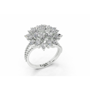 Ring with a central 0.20ct Princess Cut diamond, 0.83ct Pear Cut diamonds and 0.30ct Marquise Cut diamonds
